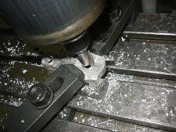  Using a larger end mill to enlarge the hole and speed up the next boreing operation.